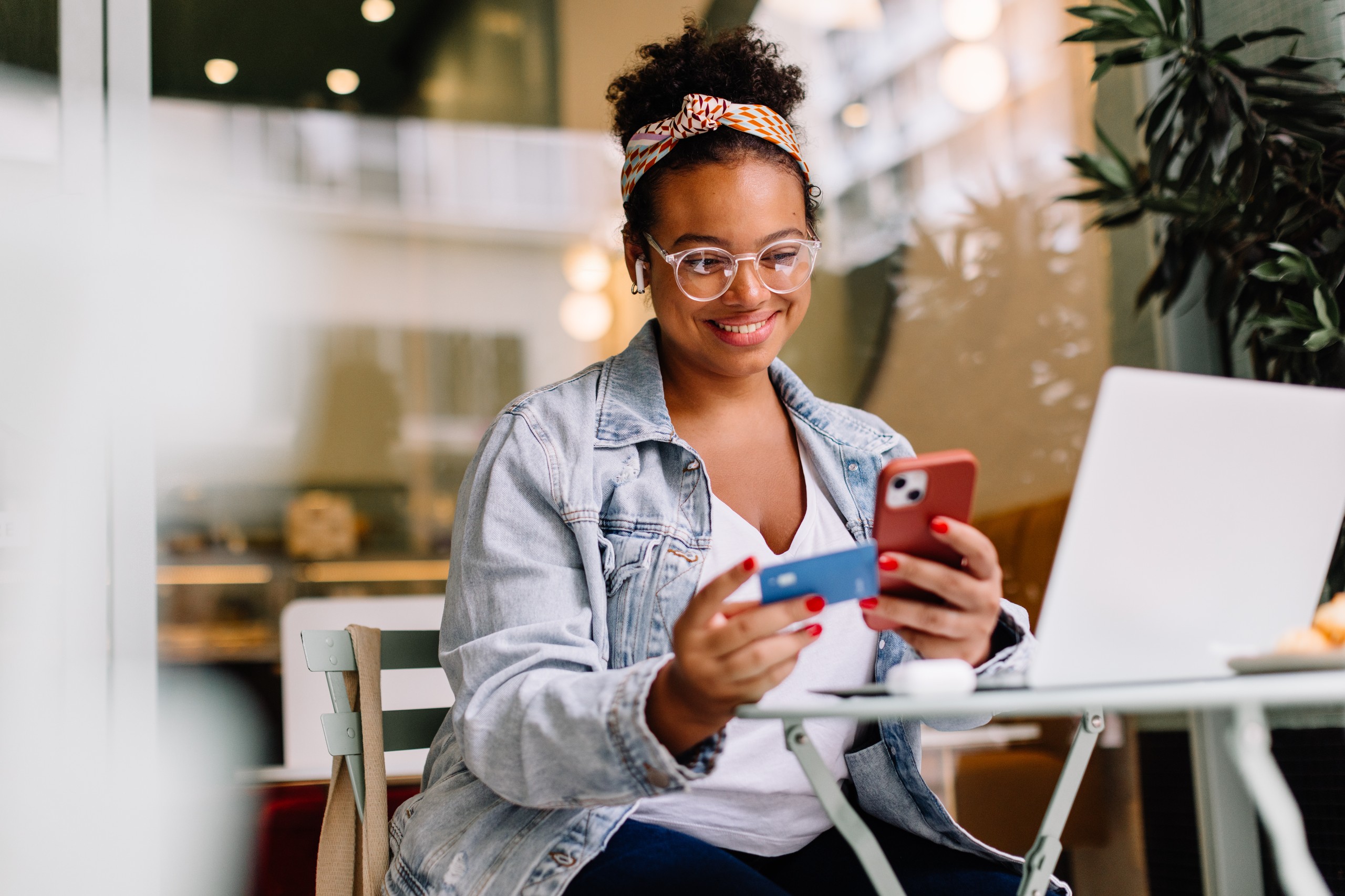 A person speedily purchasing items from a browser by using her credit card.